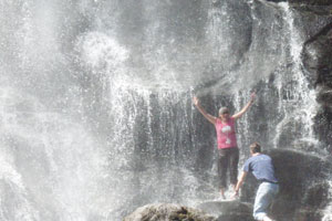 Getting wet in the remote waterfall