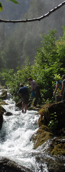 Walking up a stream to a remote waterfall